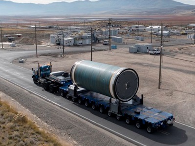 First-BOLE-Solid-Rocket-Motor-Segment-for-NASAs-Space-Launch-System rocket motor segment being transported on flat bed truck