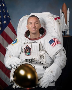 Astronaut Randolph Bresnik in spacesuit