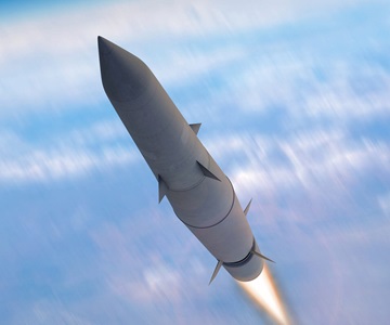 hypersonics missile flying above clouds