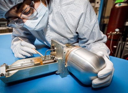 technician work on satellite part