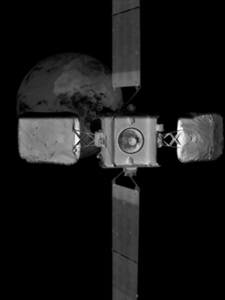 MEV2-dock A black and white space image of an Intelsat satellite with Earth in background