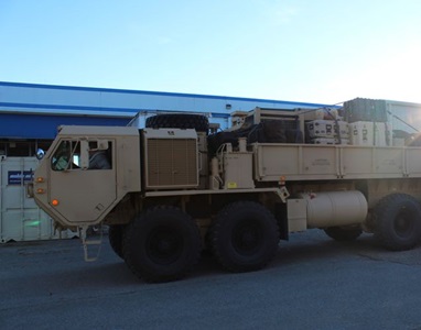First-Production-Delivery-for-the-US-Armys-Integrated-Battle-Command-System military truck loaded with weapons system.