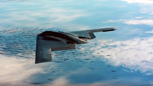 B-2 flying above clouds