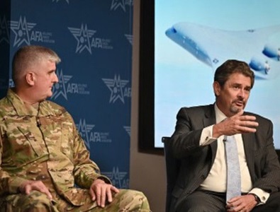 Northrop-Grumman-US-Air-Force-announcement-of-blended-wing-body-2 two males speaking on a panel