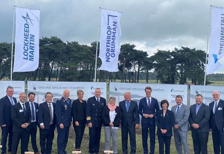 10 people in a line a groundbreaking ceremony