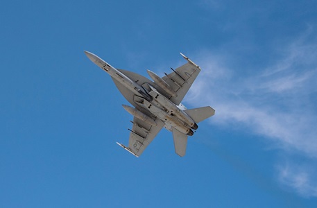 Northrop Grumman’s LITENING Advanced Targeting Pod Completes Initial US Navy F/A-18 Flight Testing F/A-18 jet flying in blue sky