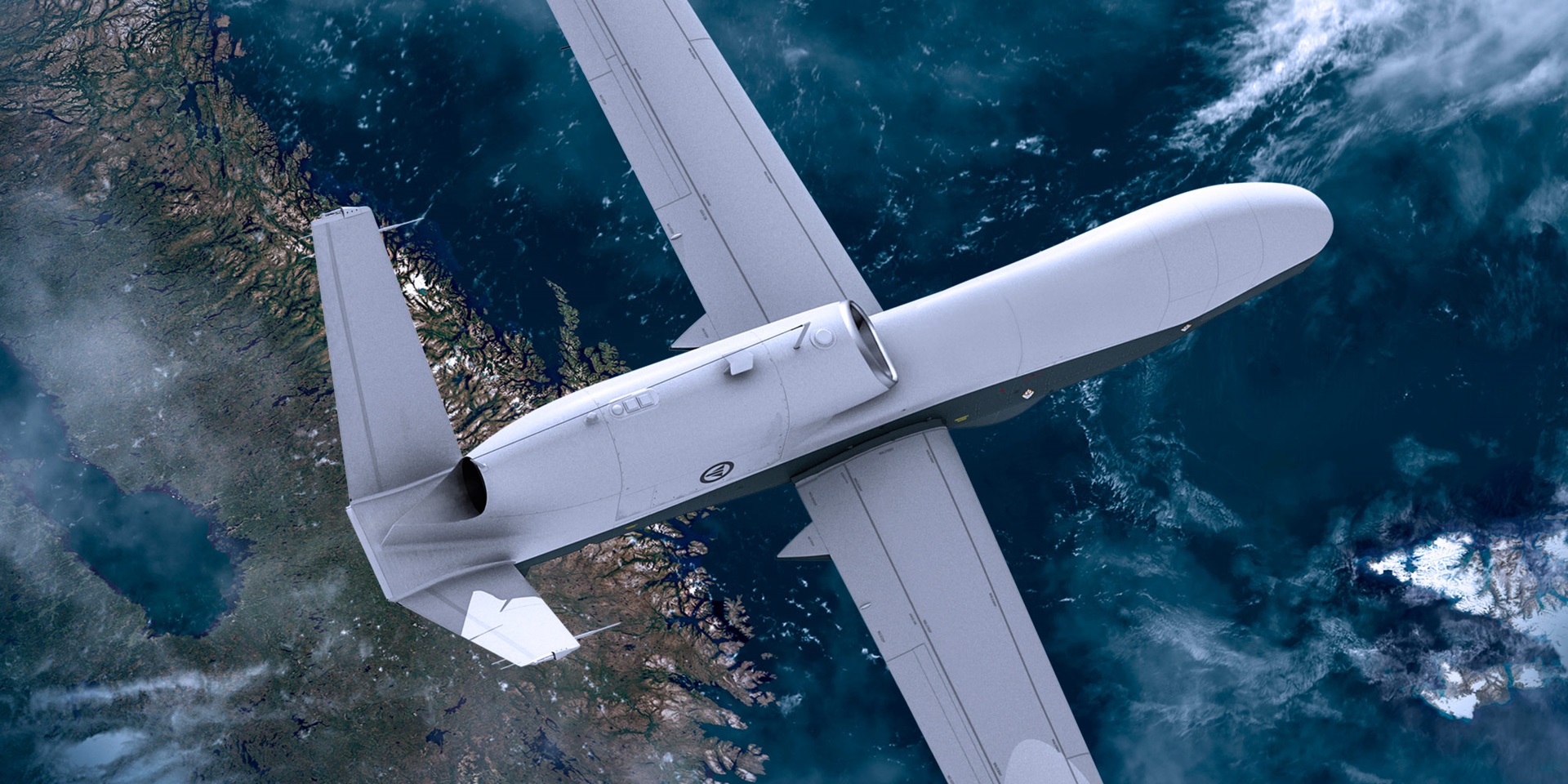 MQ-4C Triton flying above the ocean and clouds