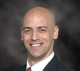 smiling white male with no hair