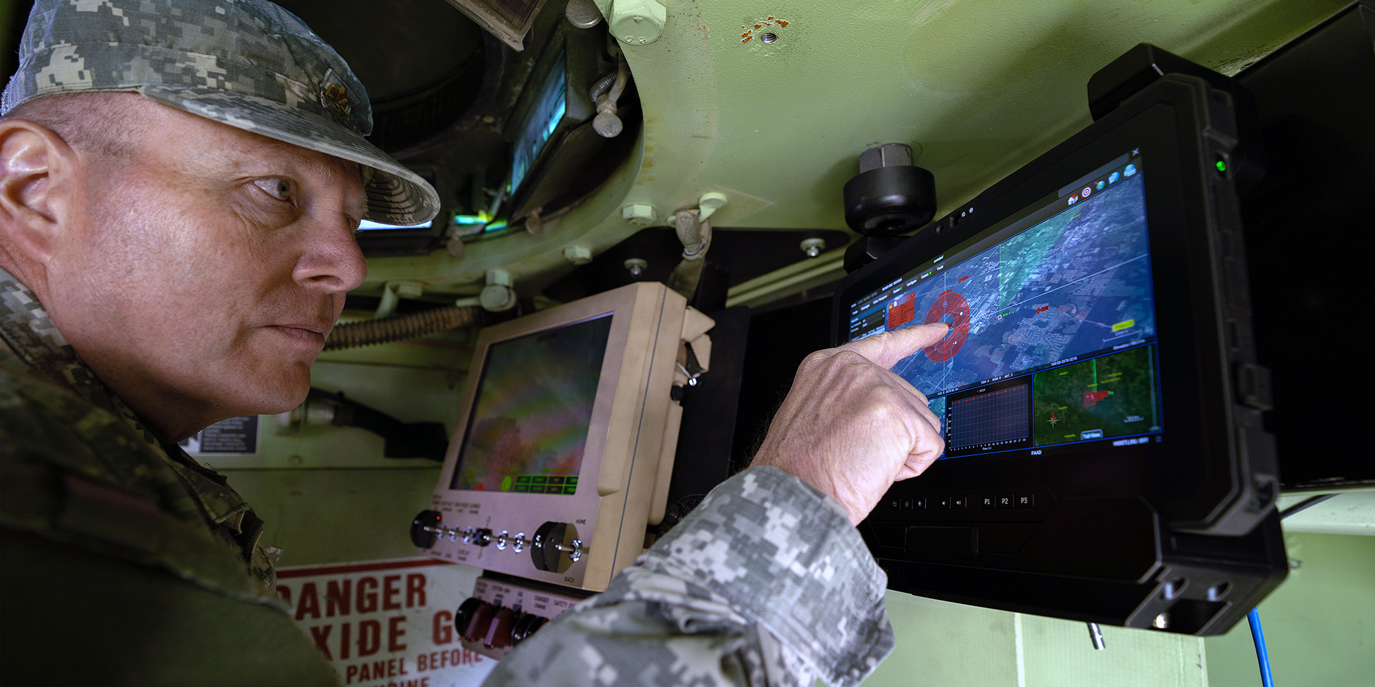 US military personnel operating mission screen