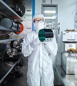 Advanced Technology Laboratory Clean Room employee working in microelectronics lab