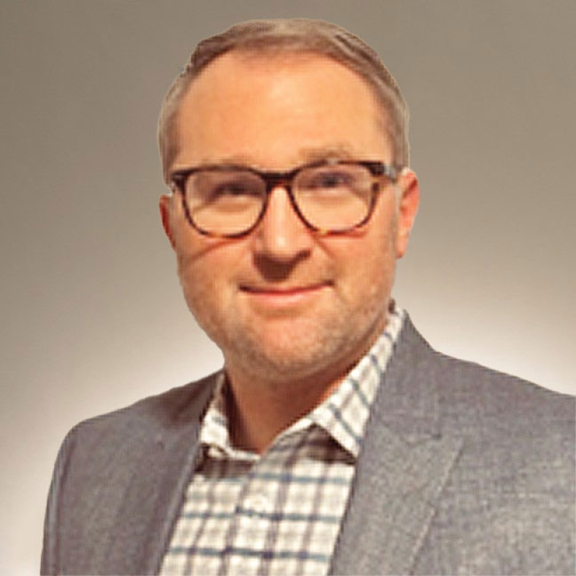 headshot of man dressed in business suit