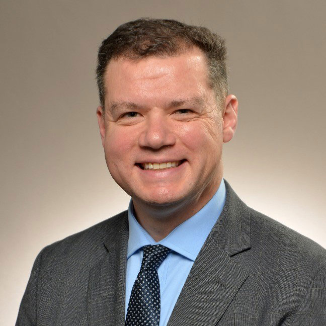 Matt Hicks, Sr. Director of Foundries, Test & Advanced Packaging (FTAP), Northrop Grumman Microelectronics Center (NGMC) Northrop Grumman Mission Systems (NGMS) headshot of man dressed in business suit