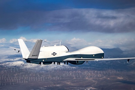 Triton flying over snowy mountains