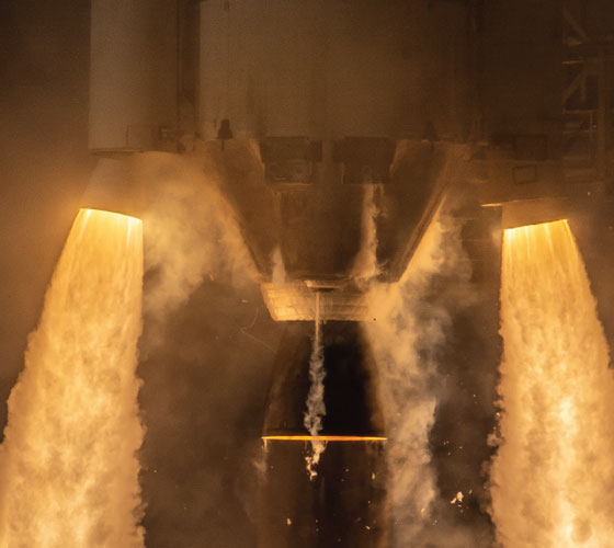 Close up image of rocket boosters ignited