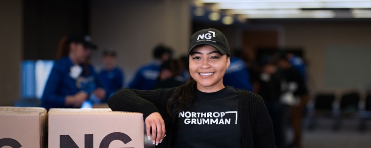 Northrop Grumman Employee vounteers with Rise Against Hunger
