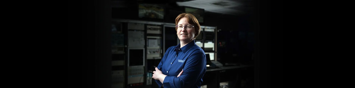 woman in blue jacket