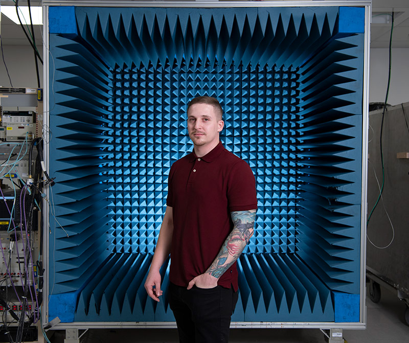 AN/APG-81 AESA Fire Control Radar – 1K Milestone Campaign man standing in front of radar