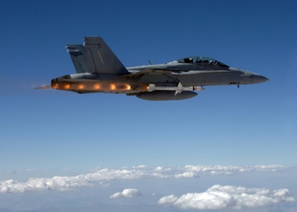 Advanced Anti-Radiation Guided Missile (AARGM) military fighter jet about to fire missile