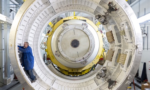 Artemis-Banner-Content Engineer works on solid rocket motor