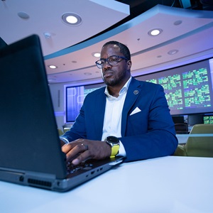 Artificial Intelligence and Machine Learning man typing on laptop