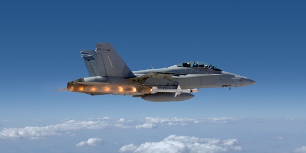 Benefits of International Cooperative Programs for Weapons Fighter jet shooting Advanced Anti-Radiation Guided Missile AARGM above blue skies