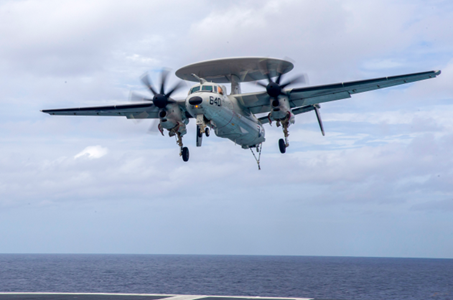 E-2D Advanced Hawkeye Military aircraft landing on carrier deck