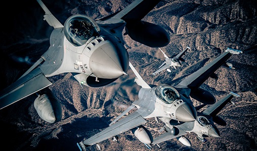 F-16 Electronic Warfare Suite F-16's jet flying over mountains