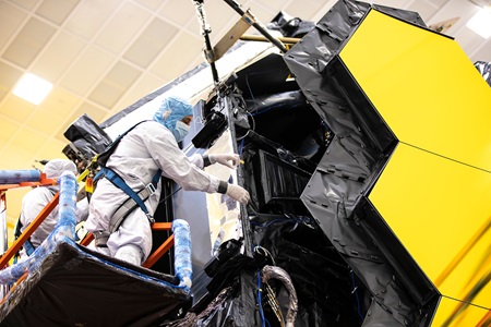 JWST Precision Back Plane Employee working on the JWST