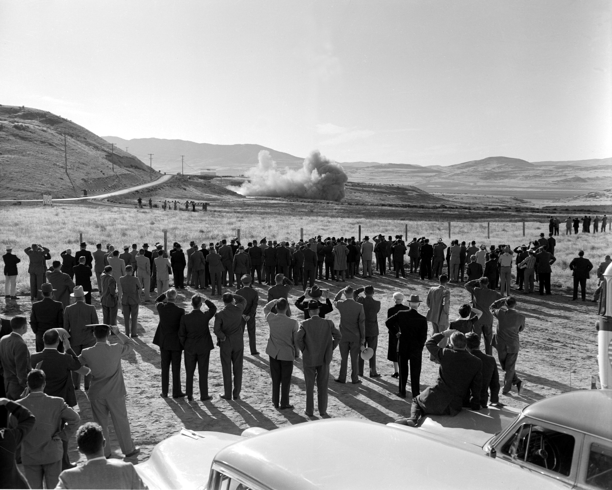 Promontory Motor Test 1957 people watching rocket motor test in desert