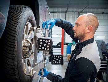 technician working on automobile