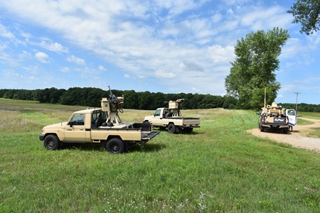 M-ACE A picture of a vehicle in a green field with the M-ACE capability.