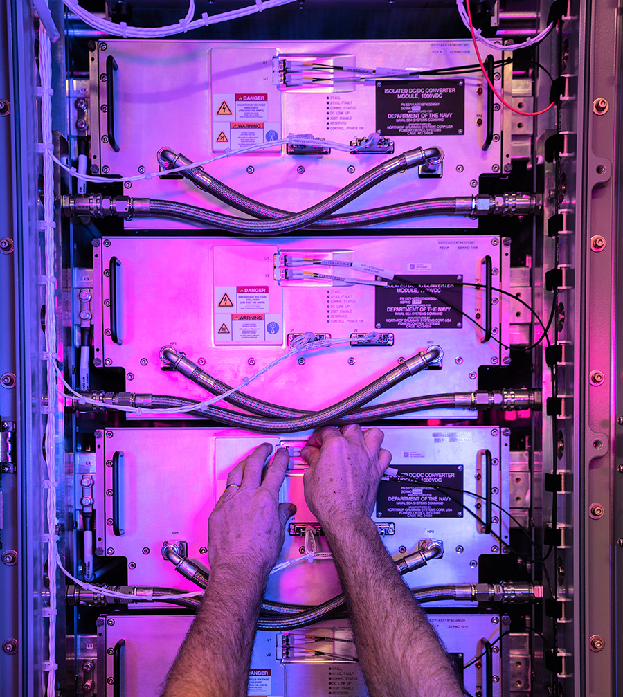 MPPS_Sykesville-_01_26_22_DSC08772sized Employee's hands working on an electronics rack