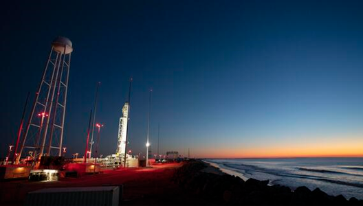 Making History in Space Artemis rocket on launchpad at sunset