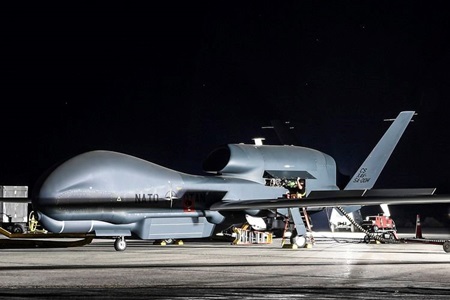 NATO AGS News Image aircraft being serviced at night