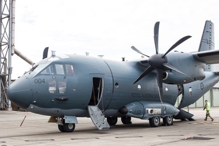 C-27J Spartan Battlefield Airlifter A large gray aircraft sits with its door open