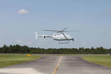 Fire Scout helicopter hovering above ground