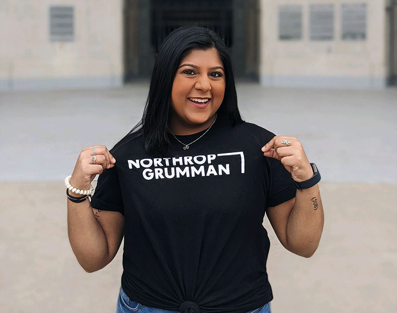 Return of the Interns Young woman intern wearing Northrop Grumman t-shirt