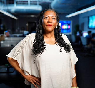 Teaching Through Fellowship Black woman in computer lab