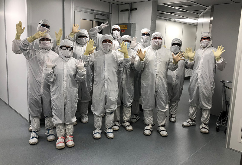 Microelectronics – Advanced Technology Lab – employees group of employees wearing protective lab suits