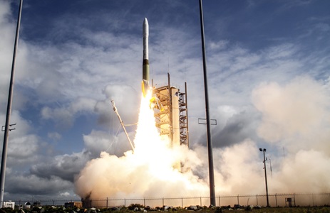 A rocket blasting off from launch pad