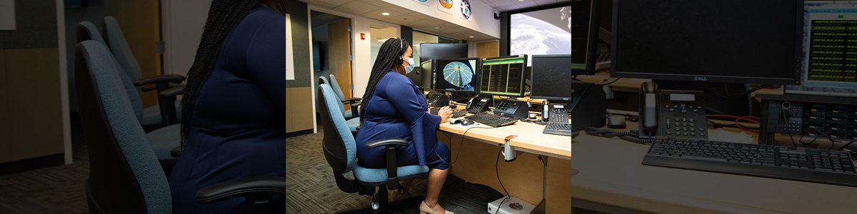 Black woman at computer station