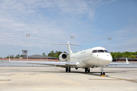 military plane parked on runway