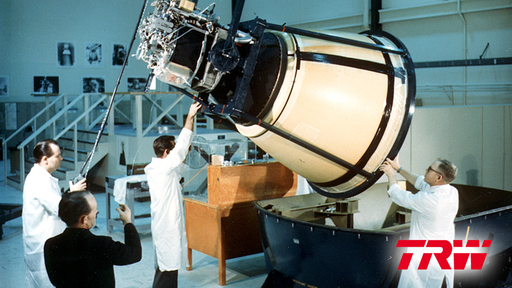 engineers working on early space craft