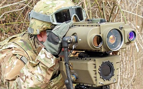 lightweight laser designator rangefinder (lldr) soldier looking thourgh viewfinder of lightweight laser designator rangefinder (lldr)