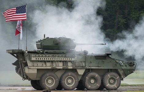 XM813 Bushmaster chain gun tank with American flag and Bushmaster chain gun