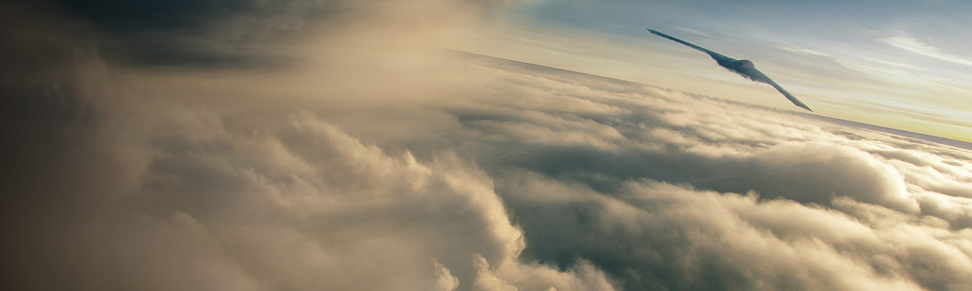 B-21 Raider flying off into the clouds