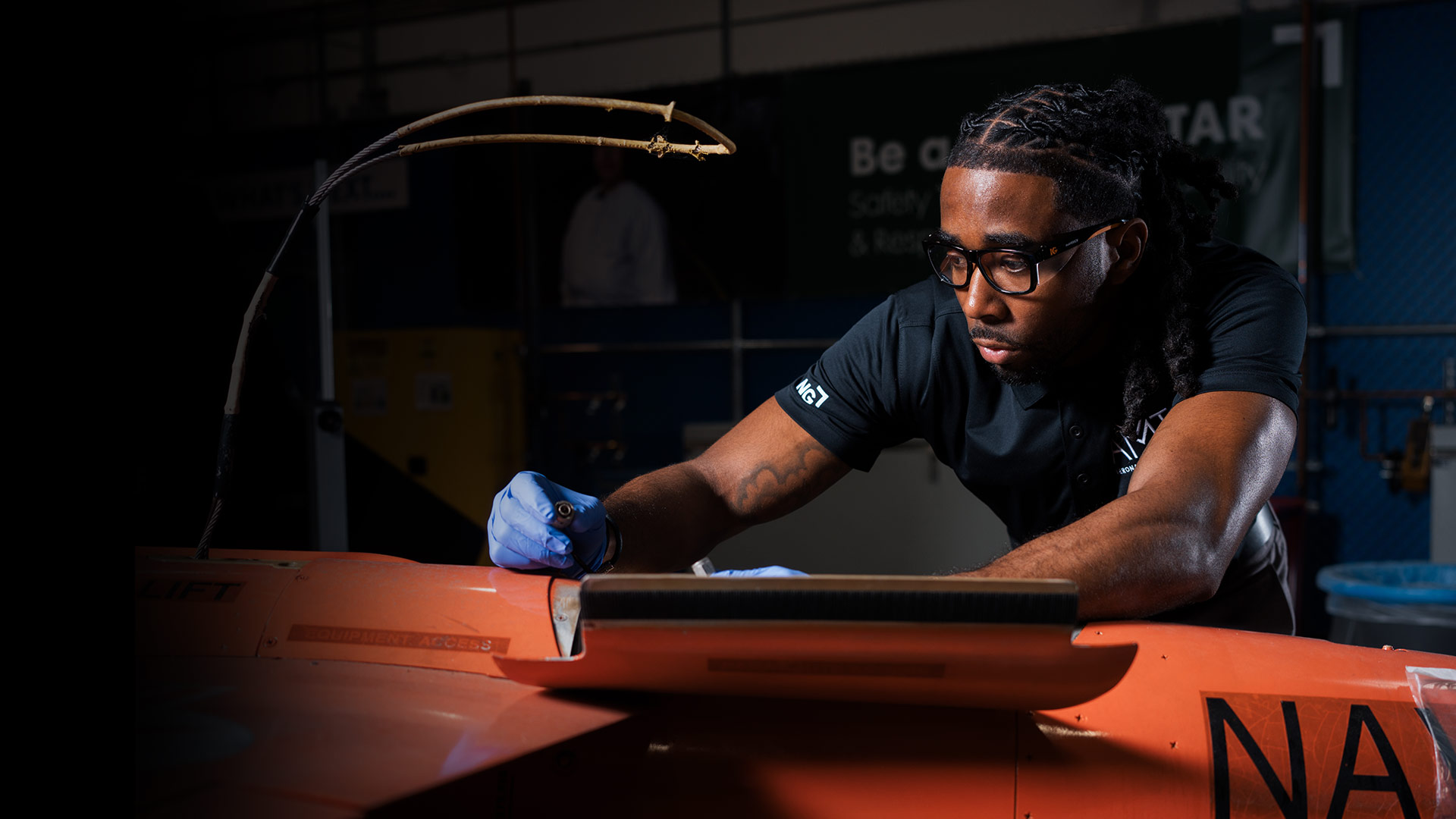 Engineer in black shirt working