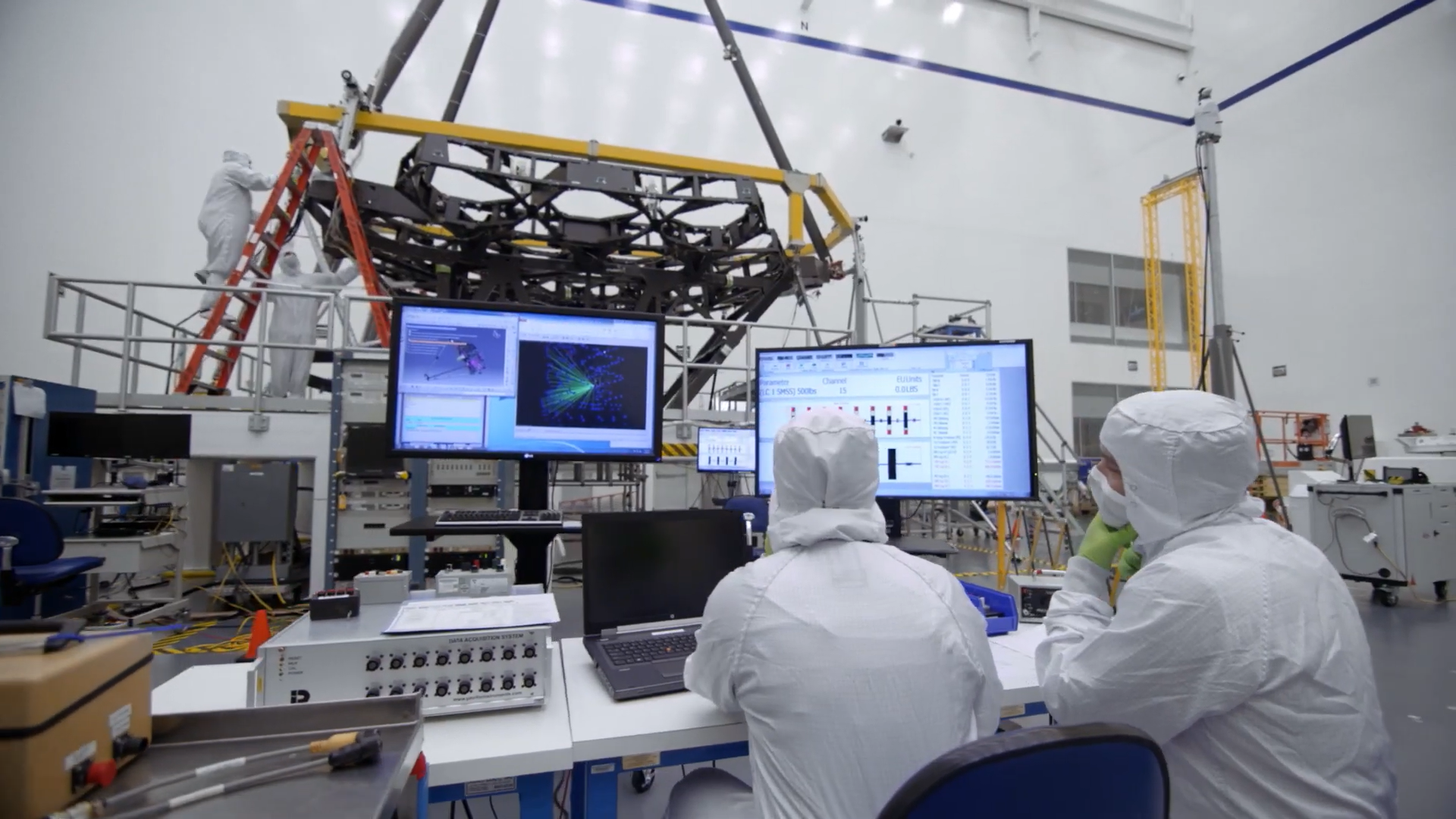 Two engineers at a computer