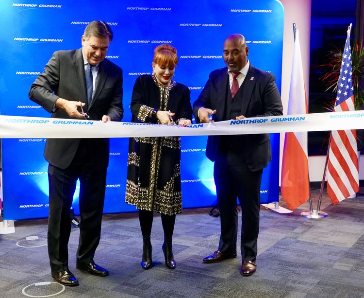Northrop_Grumman_Poland_global Individuals cutting ribbon at event
