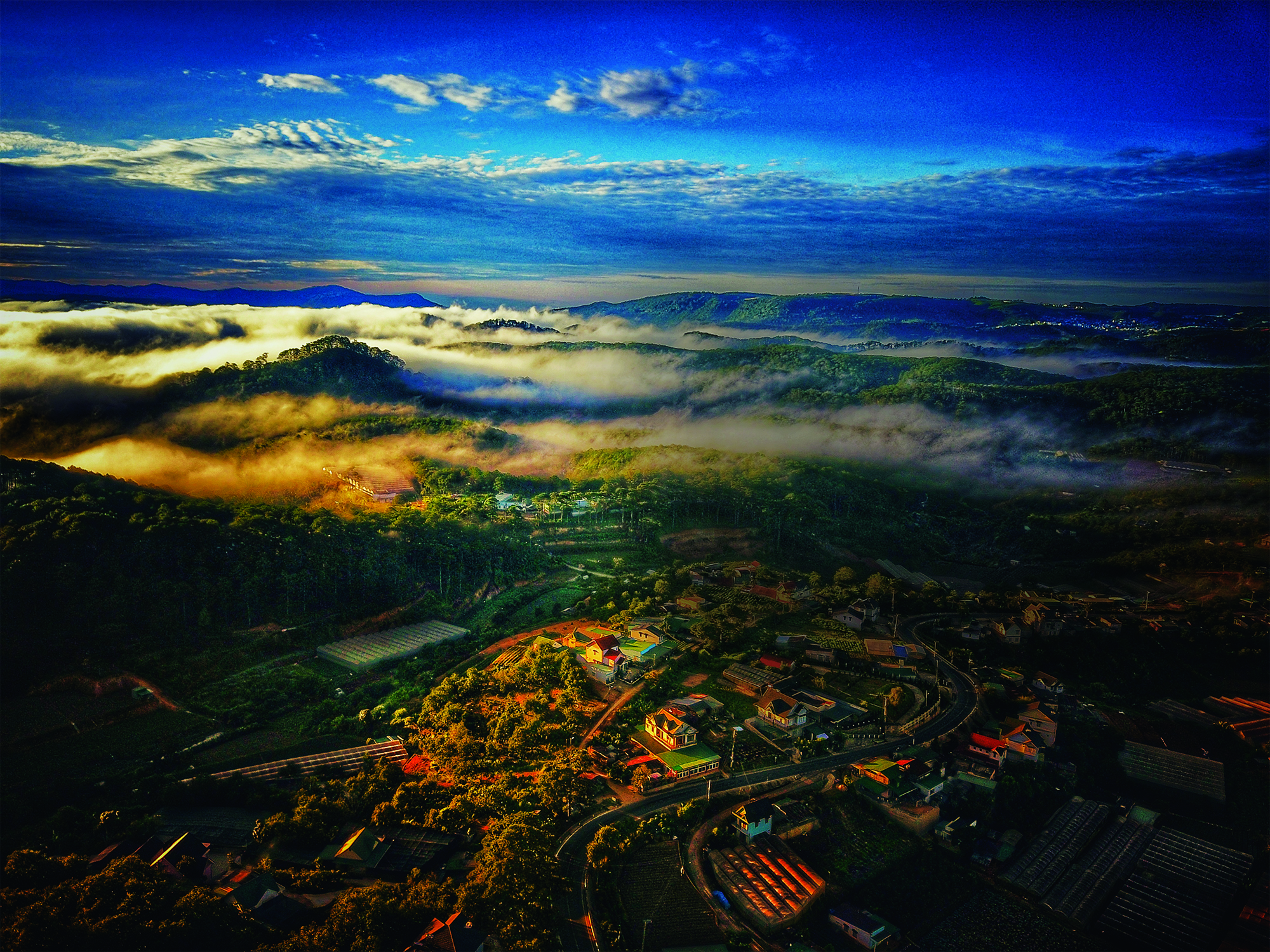 Northrop Grumman manager volunteers in Vietnam Foggy Mountains and beautiful sunrise in Da Lat